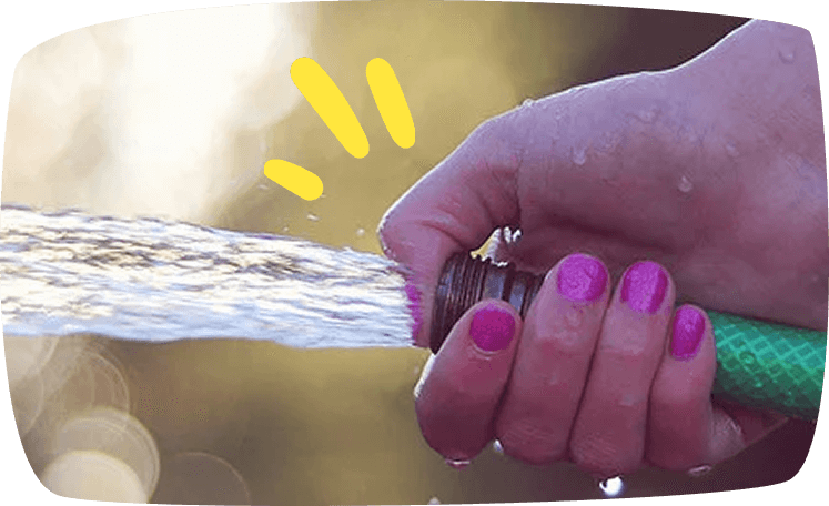 hand with watering can